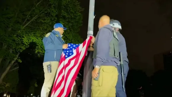 NYPD Officers Remove Palestinian Flag, Raise American Flag After Evicting Protesters at City College