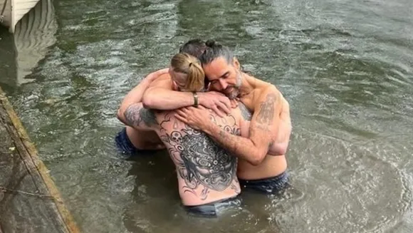 Russell Brand Baptized in Thames River with Bear Grylls