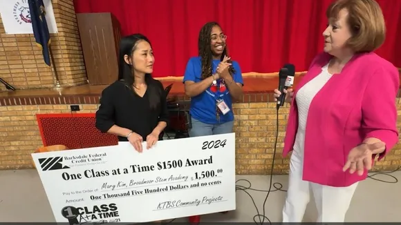 KTBS 3's Jan Elkins Presents $1,500 Check to Broadmoor Stem Academy Librarian Mary Kim