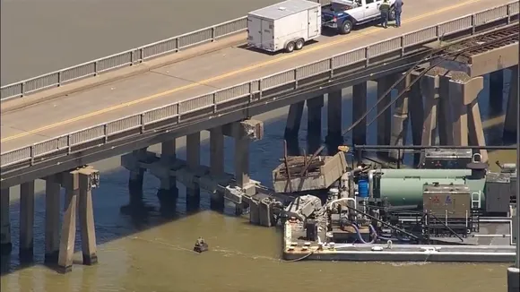 Barge Collides with Bridge Pillar in Galveston, Texas, Damaging the Structure and Causing an Oil Spill