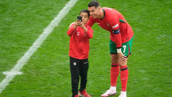 Fans Invade Field for Selfies with Cristiano Ronaldo During Portugal vs Turkey Euro 2024 Match