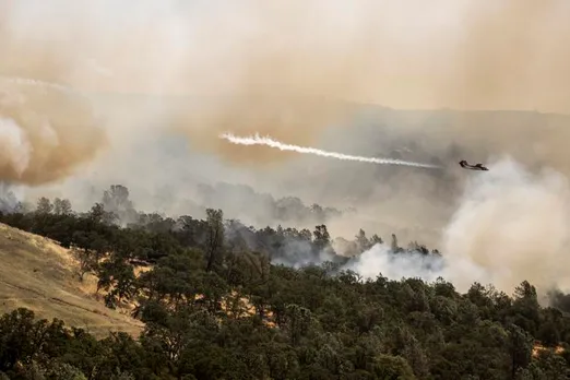 Firefighters Work Tirelessly as Northern California Wildfires Force 26,000 to Evacuate