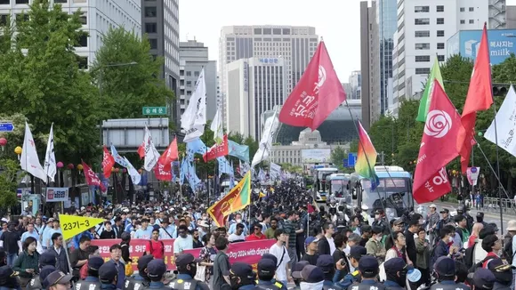 South Korean and Filipino Workers Rally on May Day for Better Working Conditions and Labor Rights