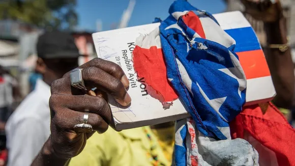 Haiti Faces Potential Coup as Warlord Barbecue Threatens Port-au-Prince