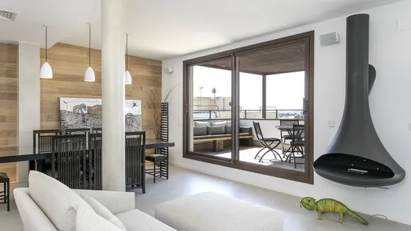 Douglas Loewe's Renovation Boosts Penthouse Value in Barcelona's Eixample