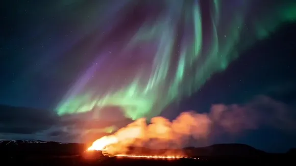 Aurora Borealis Illuminates Erupting Volcano in Stunning Time-Lapse Video from Iceland