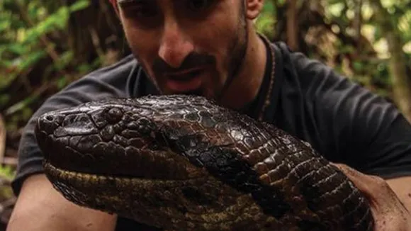 Conservationist Paul Rosolie's Harrowing Encounter with an Anaconda for Discovery Channel