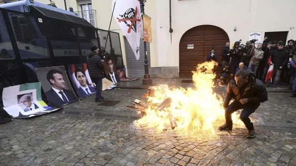 Protesters in Turin Block Highway, Burn G7 Leaders' Images Ahead of Climate Meeting