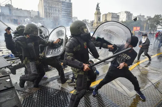 Argentine Riot Police Use Water Cannons and Tear Gas to Disperse Protesters Outside Congress