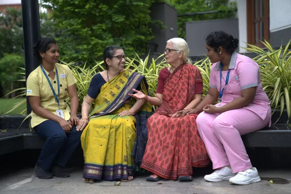 Elderly women with caretaker