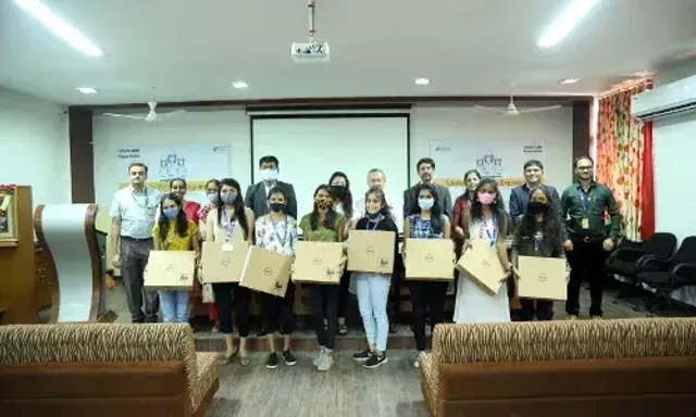 Parul University's girl student engineers receive scholarships and laptops under the Women in Engineering program