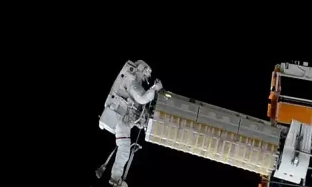 NASA astronauts install new roll-out solar array on Space station