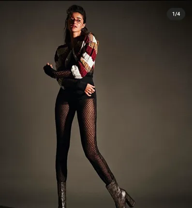 Ananya Panday raises temperatures in her fishnet stockings and sweater look!