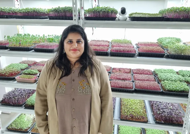 Aditi Mali at her indoor microgreens farm