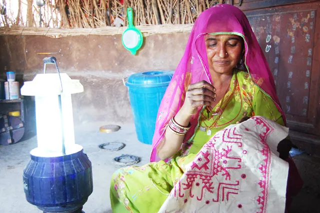 A woman of the Meghwal community engrossed in embroidery. Pic: SURE, Barmer 