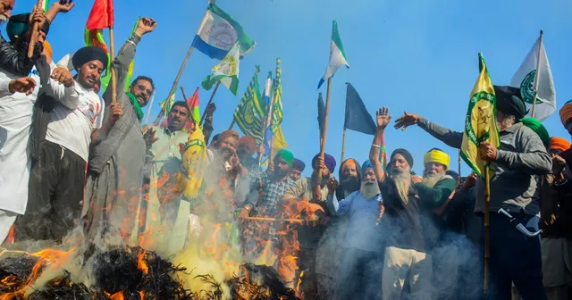 Farmers burn effigies during the 'Black Day' protest at the Punjab-Haryana Shambhu border, in Patiala district, Friday, Feb. 23, 2024. Farmers are observing 'Black Day' following the death of a farmer at Khanauri border in Sangrur district