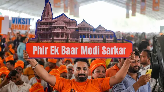 Supporters during a public meeting in support of BJP candidates for Lok Sabha polls, at Dwarka in New Delhi, Wednesday, May 22, 2024