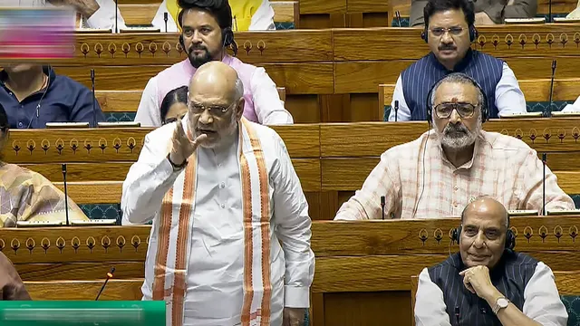 Union Home Minister Amit Shah speaks in the Lok Sabha during the Monsoon session of Parliament, in New Delhi, Thursday, Aug. 8, 2024.