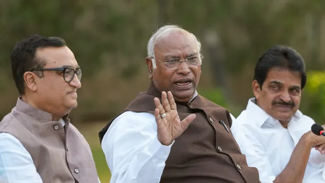 Congress President Mallikarjun Kharge with party leaders Ajay Maken and K.C. Venugopal addresses a press conference at his residence, in New Delhi