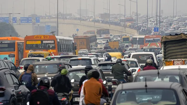 Vehicles stuck in a traffic jam at Ghazipur border amid restrictions in vehicular traffic in view of farmers' 'Delhi Chalo' march, in New Delhi