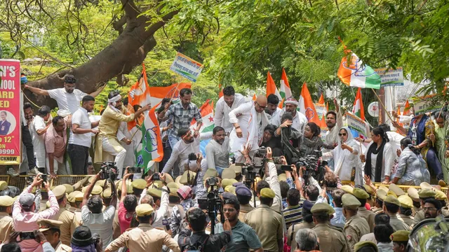 Uttar Pradesh Congress President Ajay Rai with party workers during a protest over the alleged irregularities in NEET-UG 2024 results, in Lucknow, Friday, June 21, 2024.