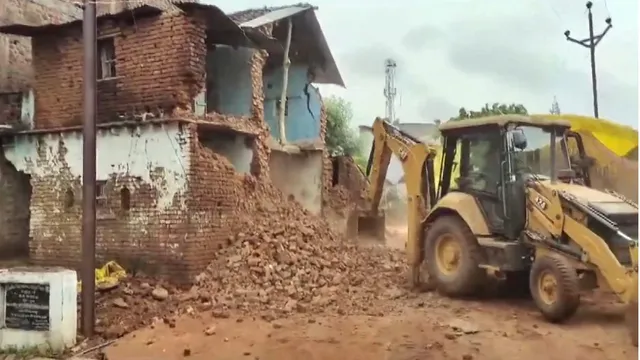 Rescue work underway after a wall collapsed at Shahpur village, in Sagar district, Sunday, Aug. 4, 2024.