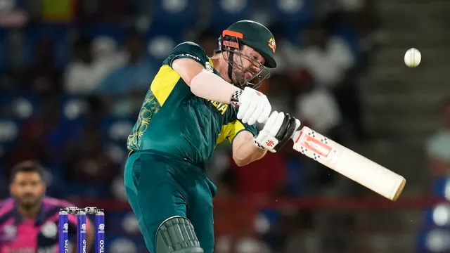 Travis Head bats during the men's T20 World Cup cricket match between Australia and Scotland, at Darren Sammy National Cricket Stadium, Gros Islet, St Lucia, Saturday, June 15, 2024.