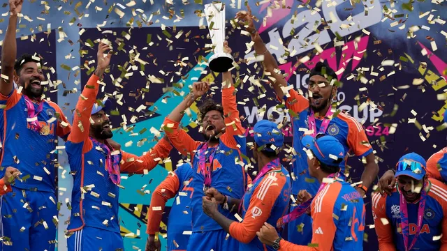 Indian players celebrate with the winners trophy after defeating South Africa in the ICC Men's T20 World Cup final cricket match at Kensington Oval in Bridgetown, Barbados, Saturday, June 29, 2024.