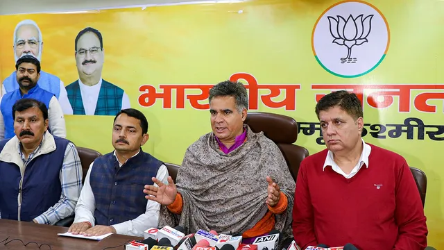 J&K BJP President Ravinder Raina addresses a press conference, in Jammu