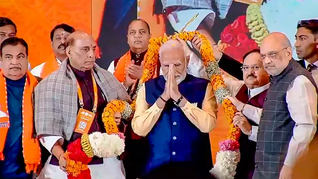 Prime Minister Narendra Modi being garlanded by Union Home Minister Amit Shah and others at BJP National Council Meeting in New Delhi