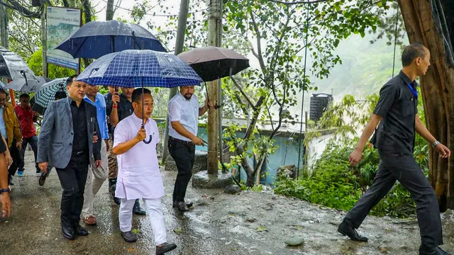 Sikkim Chief Minister Prem Singh Tamang takes stock of the situation after flash floods following a cloud burst in Singtam, Sikkim