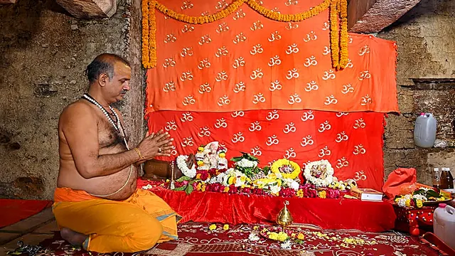 A priest performs prayers in the basement of Gyanvapi mosque following court orders