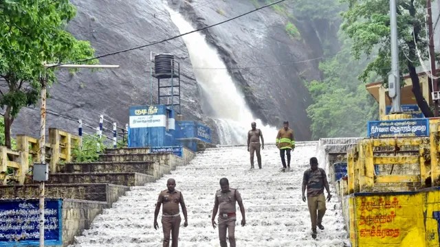 Tamil Nadu Fire & Rescue Services personnel at the spot after heavy rain triggered flash floods at Old Courtallam waterfall, in Tenkasi district, Friday, May 17, 2024. A teenage boy was washed away in the flash floods.