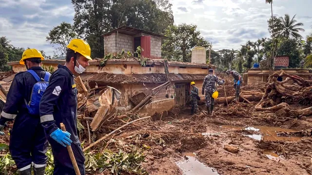 Indian Navy's disaster relief team conducts search and rescue operation at a landslide-hit area in Wayanad.