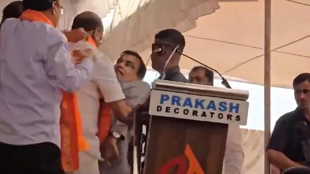 Nitin Gadkari being taken away by BJP workers after he fainted during an election rally in Yavatmal of Maharashtra