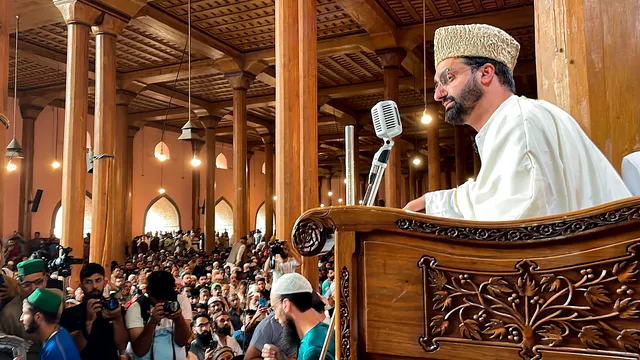 Hurriyat Conference Chairman Mirwaiz Umar Farooq delivers sermon during Friday prayers at the Jama Masjid, in Srinagar