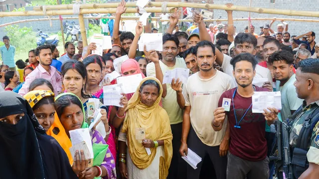 Voters wait at a polling booth to cast their votes for the seventh and last phase of Lok Sabha elections, in Godda, Jharkhand, Saturday, June 1, 2024.