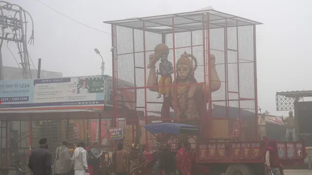 Commuters during fog on a cold winter morning, in Ayodhya