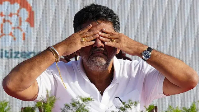 Karnataka Deputy Chief Minister D K Shivakumar performs yoga on International Yoga Day, at Vidhana Soudha, in Bengaluru, Friday, June 21, 2024