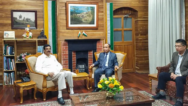 Mizoram Governor Hari Babu Kambhampati with Mizo National Front leader Zoramthanga after receiving the latter's resignation as the state chief minister