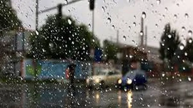 Light Rainfall droplets on a glasss.jpg