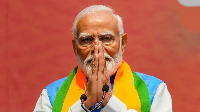 Prime Minister Narendra Modi releases the BJP's election manifesto Sankalp Patra at the party headquarters, in New Delhi, Sunday, April 14, 2024