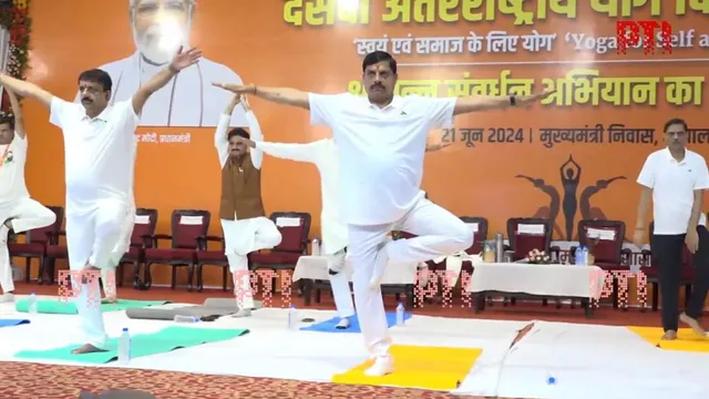 Madhya Pradesh CM Mohan Yadav performs various Yoga asanas during an event in Bhopal. 