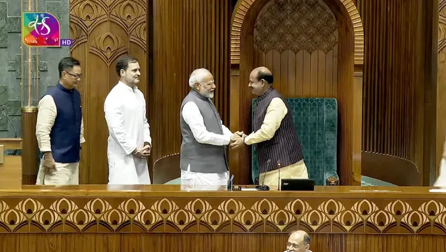 Prime Minister Narendra Modi, Leader of Opposition Rahul Gandhi escort Om Birla to Lok Sabha Speaker's chair