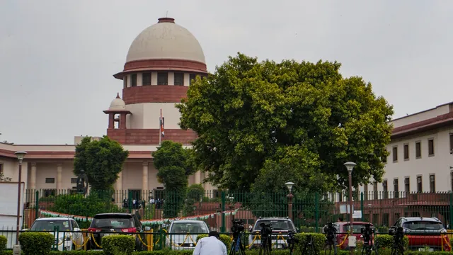 Media personnel outside the Supreme Court, in New Delhi