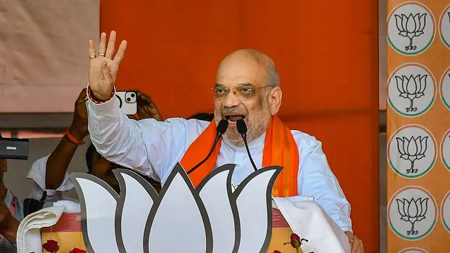 Union Home Minister Amit Shah addresses a public meeting in support of BJP candidate from Allahabad constituency Neeraj Tripathi for Lok Sabha polls, near Prayagraj, Sunday, May 19, 2024