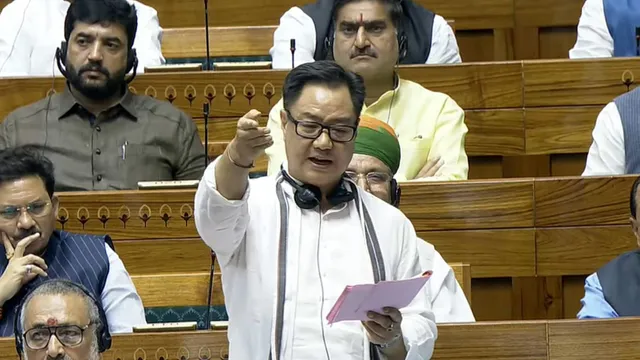 Union Minister Kiren Rijiju speaks in the Lok Sabha during the Monsoon session of Parliament, in New Delhi, Thursday, Aug. 8, 2024.