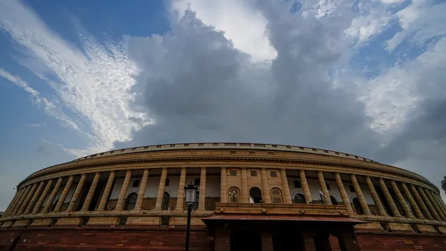 Clouds over the Parliament building during Monsoon session, in New Delhi