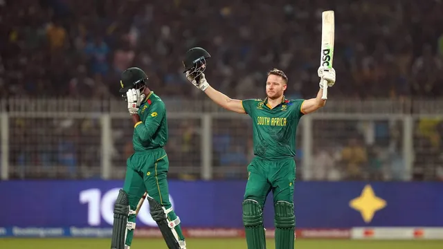 David Miller celebrates his century with Kagiso Rabada during the ICC Men's Cricket World Cup 2023 second semi-final match between South Africa and Australia, at the Eden Gardens, in Kolkata, Thursday, Nov. 16, 2023.