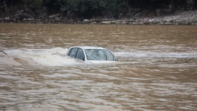 car submerged in river